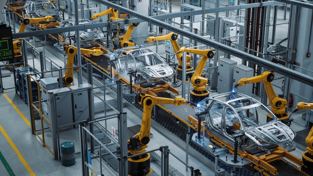 Car Factory 3D Concept: Automated Robot Arm Assembly Line Manufacturing High-Tech Green Energy Electric Vehicles. Construction, Building, Welding Industrial Production Conveyor. Elevated Wide Shot